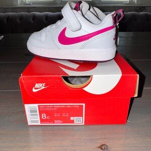 Nike White and Pink Sneakers Classic Low-Top Design